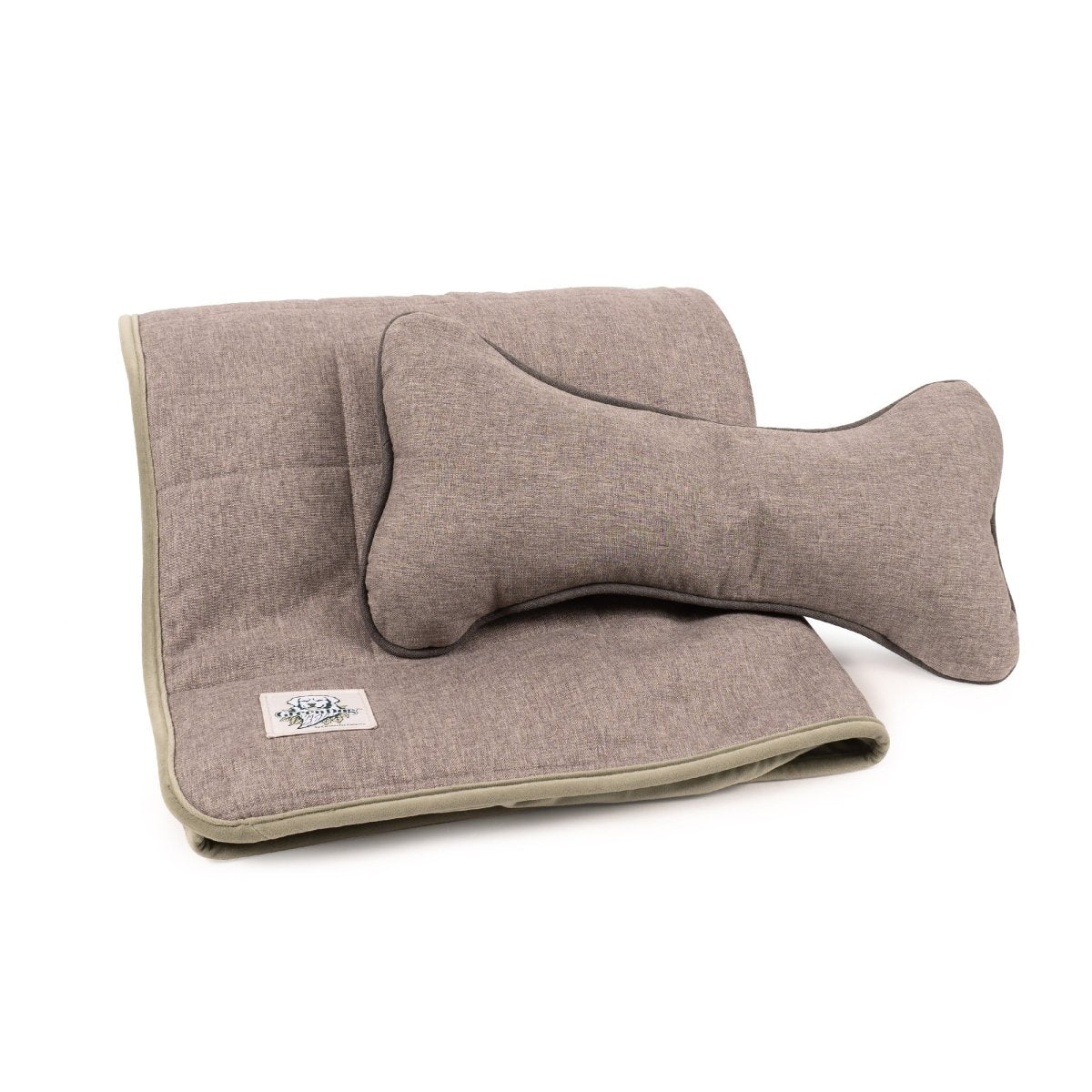 Brown fabric blanket with matching headrest cover on a white background