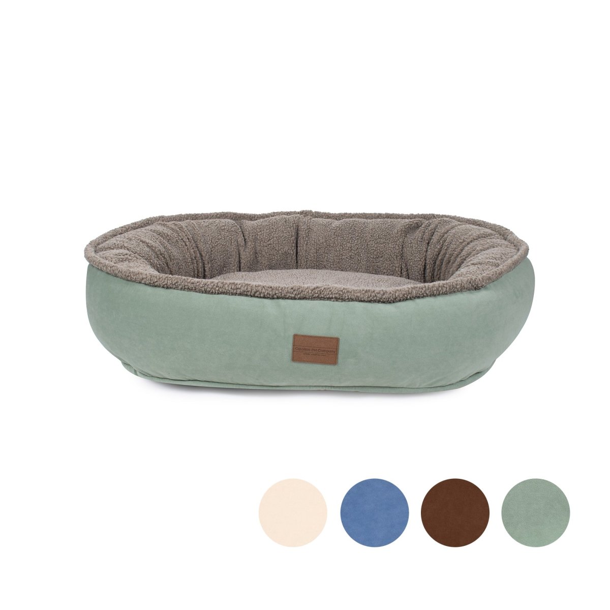 Pet bed with brown interior and green exterior on a white background