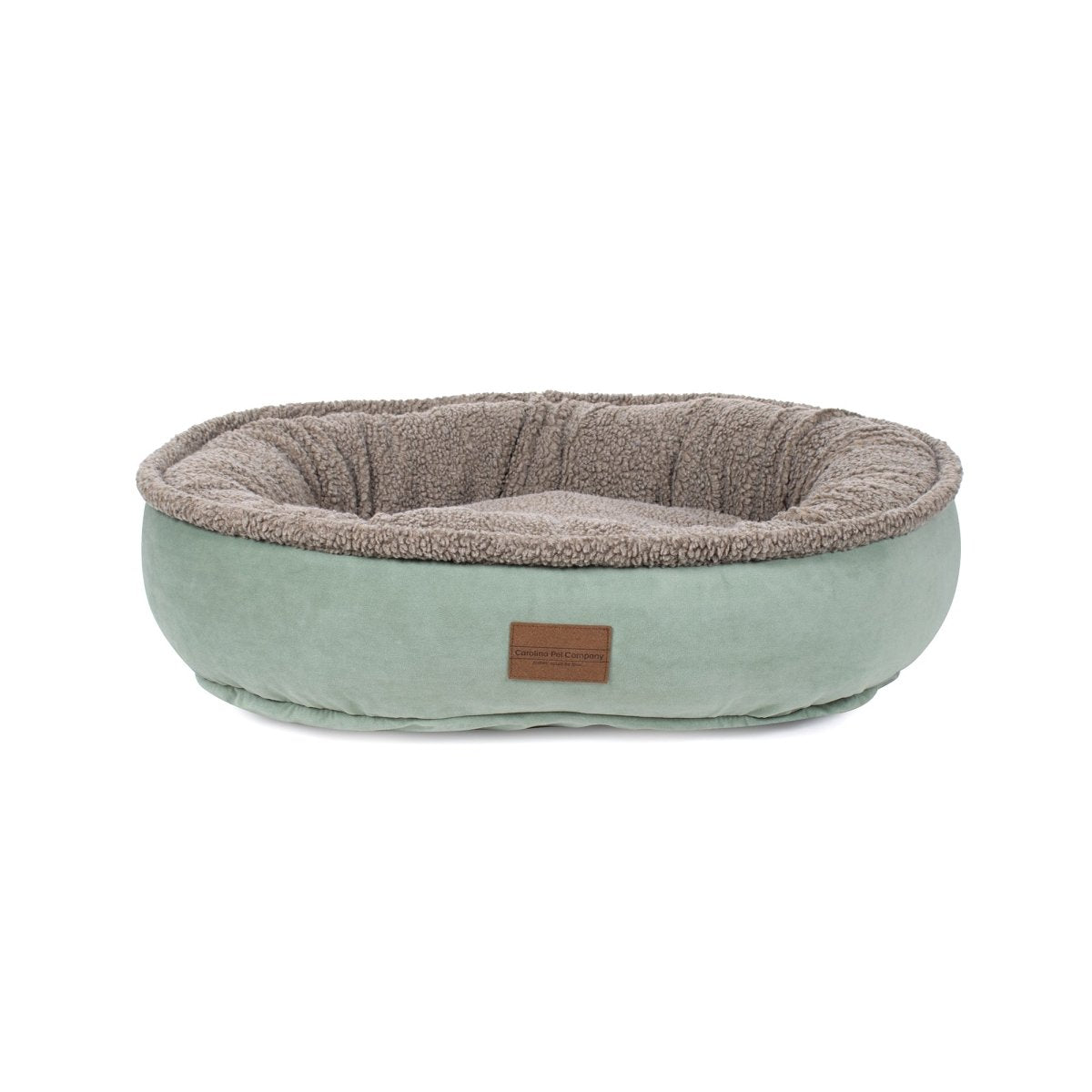 Pet bed with a brown interior and light green exterior on a white background