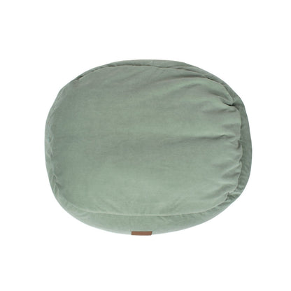 Green round cushion on a white background