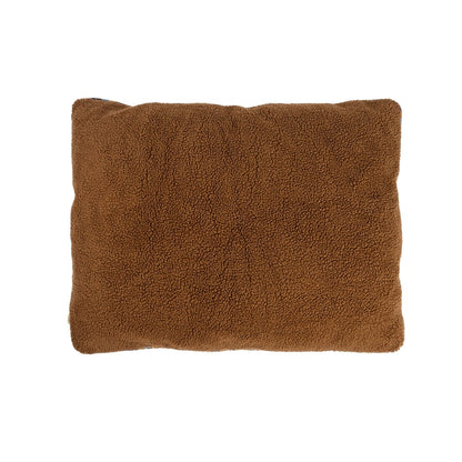 Brown textured pillow on a white background