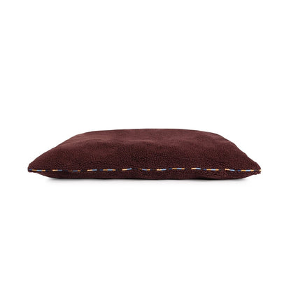 Brown rectangular pillow on a white background