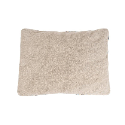 Beige pillow on a white background