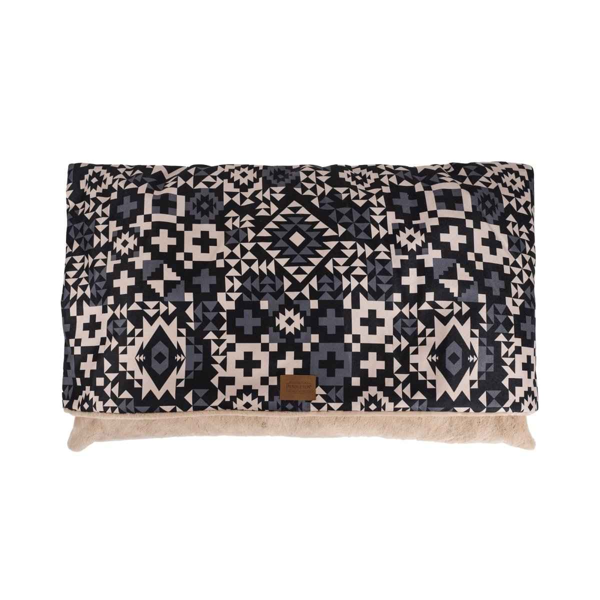Pendleton Burrow Bed in blue and black design with tan interior on white background