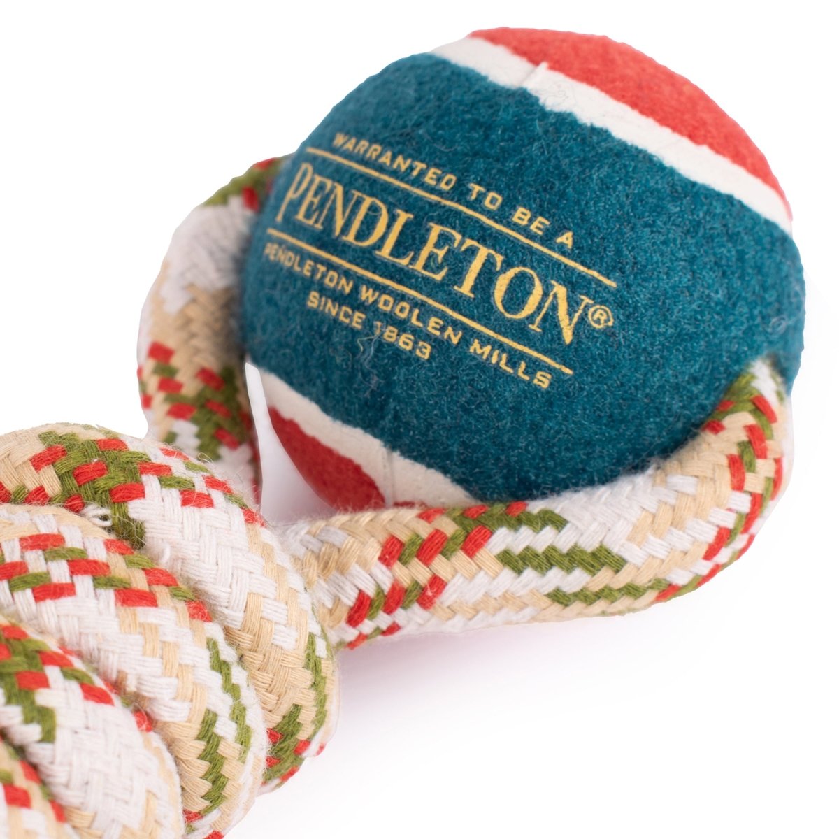 Pendleton dog toy with a woven handle on a white background