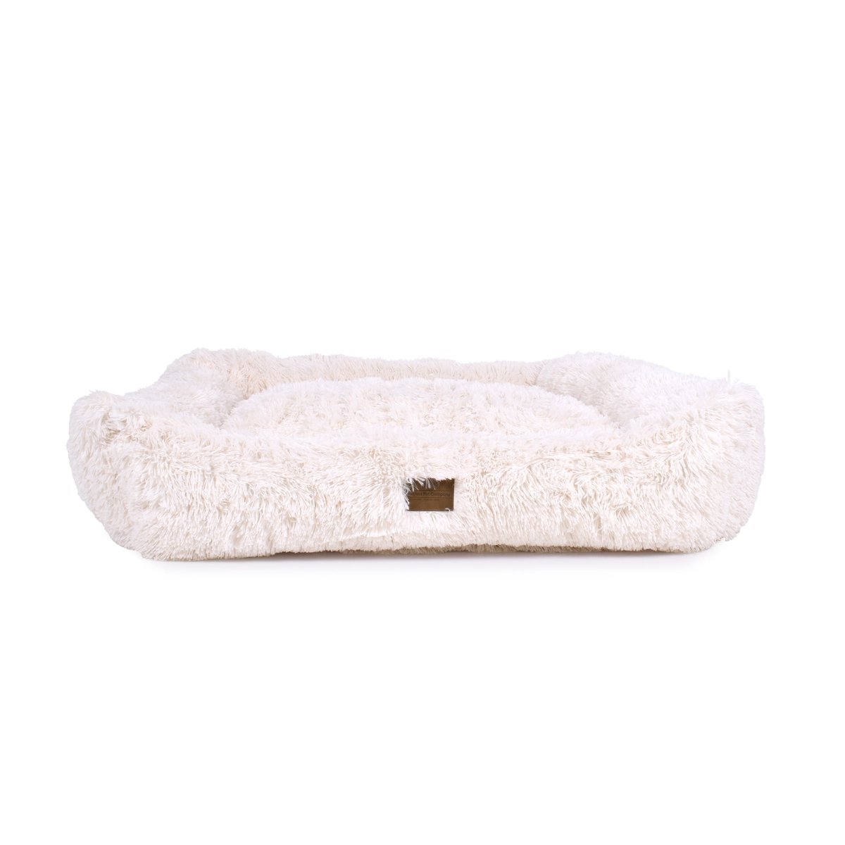 White fluffy pet bed on a white background