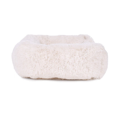 White fluffy pet bed on a white background