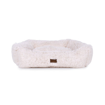 Fluffy pet bed on a white background