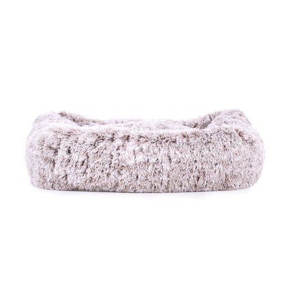 Fluffy pet bed on a white background