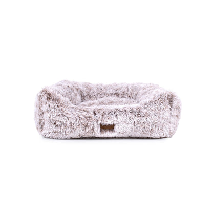 Fluffy pet bed on a white background