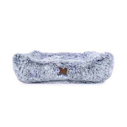 Fluffy gray pet bed on a white background