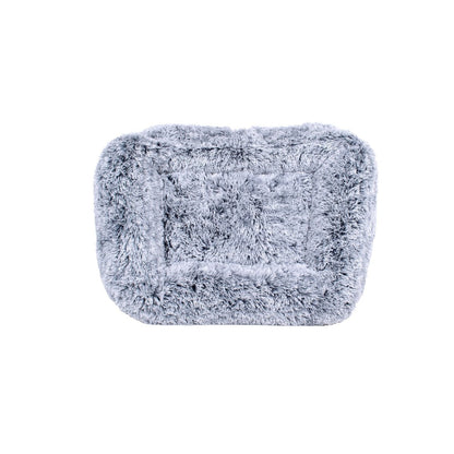 Gray textured pet bed from top view on a white background