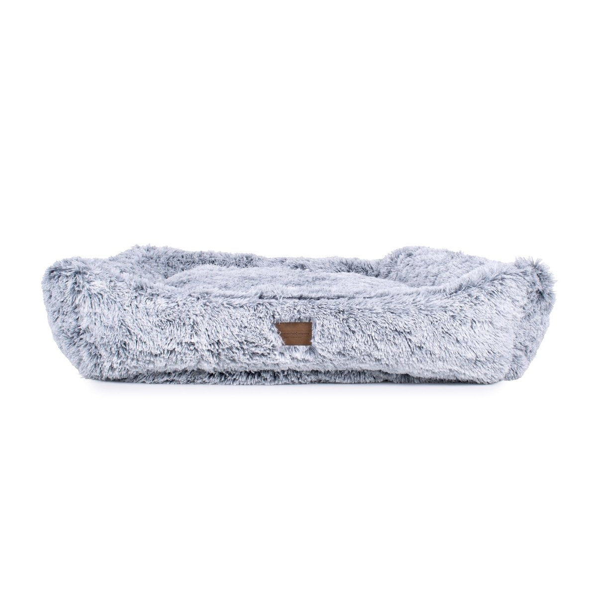 Fluffy gray pet bed on a white background